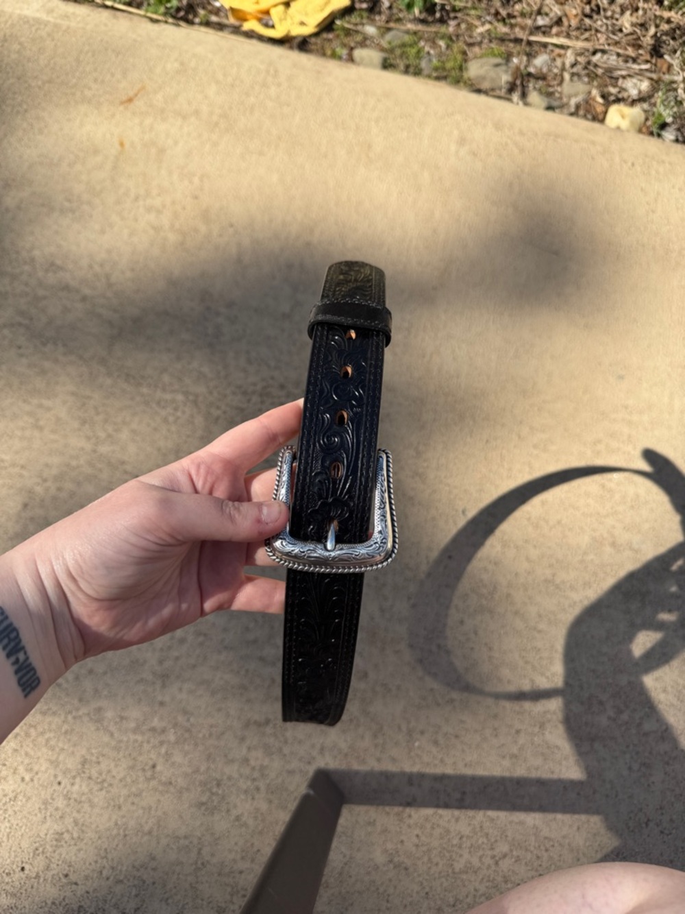 Tooled Black Leather Belt with Decorative Silver Buckle